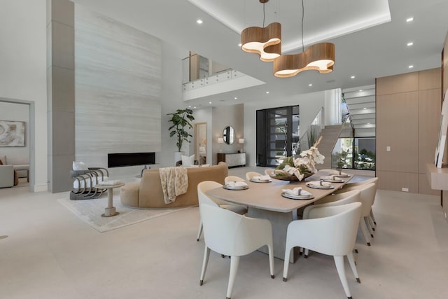 2498 Queen Palm Rd, Boca Raton, FL 33432 - dining space featuring a towering ceiling and recessed lighting
