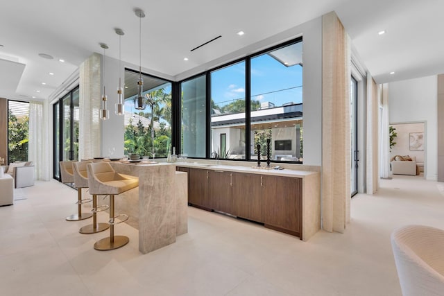 2498 Queen Palm Rd, Boca Raton, FL 33432 - bar with decorative light fixtures and floor to ceiling windows