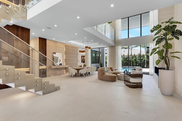 2498 Queen Palm Rd, Boca Raton, FL 33432 - building lobby with a towering ceiling, recessed lighting, and stairway