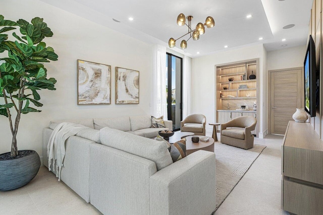 living area with built in shelves, a chandelier, and recessed lighting