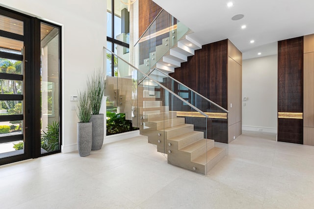 2498 Queen Palm Rd, Boca Raton, FL 33432 - staircase with recessed lighting and baseboards