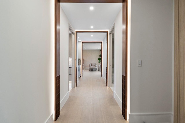 2498 Queen Palm Rd, Boca Raton, FL 33432 - hallway with recessed lighting and light wood-style floors