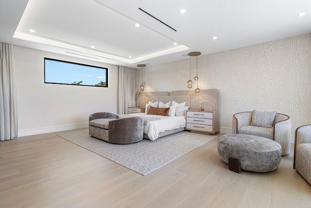 2498 Queen Palm Rd, Boca Raton, FL 33432 - bedroom featuring a tray ceiling, wood finished floors, recessed lighting, and wallpapered walls