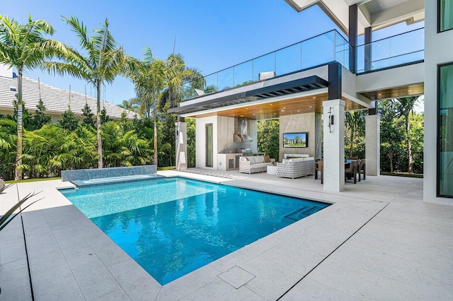 outdoor pool with an outdoor living space, a patio area, and area for grilling