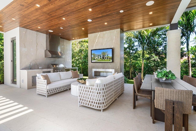 2498 Queen Palm Rd, Boca Raton, FL 33432 - view of patio with exterior kitchen, an outdoor living space with a fireplace, and outdoor dining space