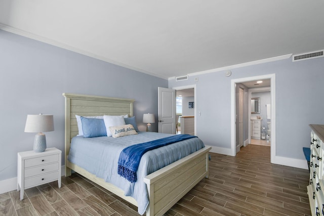 bedroom with ornamental molding, wood tiled floors, and baseboards