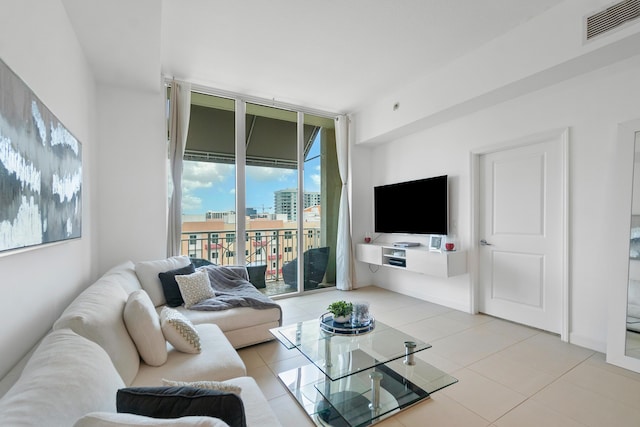 480 Hibiscus St Unit 1003, West Palm Beach, FL 33401 - living area with visible vents and tile patterned flooring
