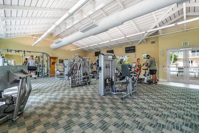 480 Hibiscus St Unit 1003, West Palm Beach, FL 33401 - workout area with plenty of natural light, french doors, high vaulted ceiling, baseboards, and carpet