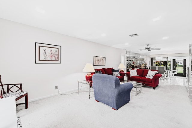 9750 Tabebuia Tree Dr Unit A, Boynton Beach, FL 33436 - living area featuring baseboards, ceiling fan, carpet, and visible vents