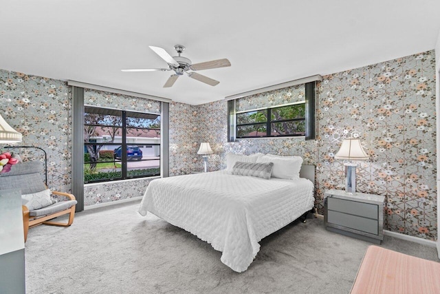 9750 Tabebuia Tree Dr Unit A, Boynton Beach, FL 33436 - bedroom with baseboards, carpet, multiple windows, and wallpapered walls