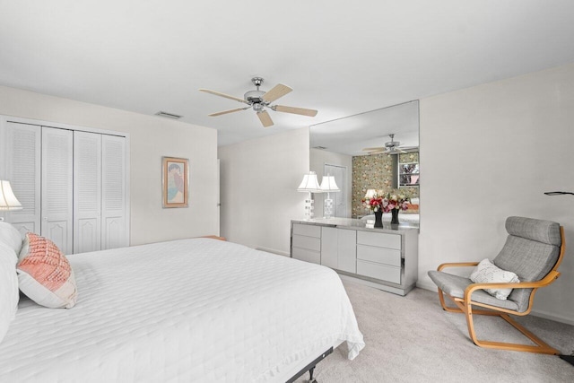 9750 Tabebuia Tree Dr Unit A, Boynton Beach, FL 33436 - bedroom with ceiling fan, light carpet, a closet, and visible vents