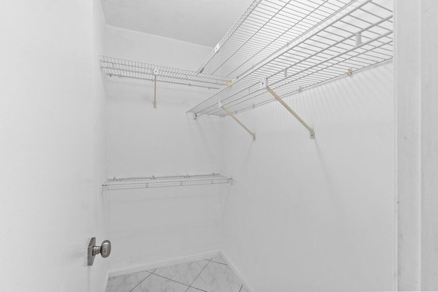 9750 Tabebuia Tree Dr Unit A, Boynton Beach, FL 33436 - walk in closet with marble finish floor