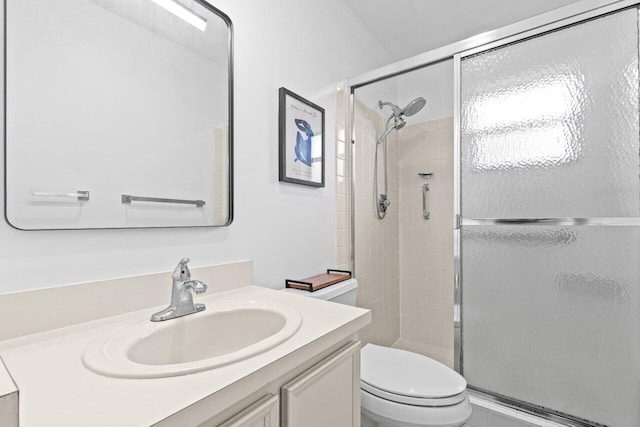 9750 Tabebuia Tree Dr Unit A, Boynton Beach, FL 33436 - bathroom featuring vanity, toilet, and a stall shower