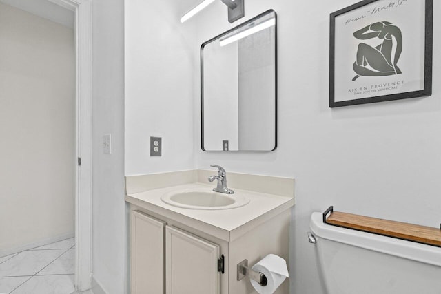 9750 Tabebuia Tree Dr Unit A, Boynton Beach, FL 33436 - half bathroom with toilet, baseboards, marble finish floor, and vanity