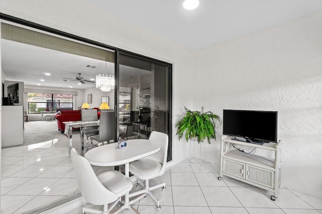 9750 Tabebuia Tree Dr Unit A, Boynton Beach, FL 33436 - dining space with visible vents, a ceiling fan, a textured wall, and light tile patterned floors
