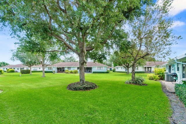 9750 Tabebuia Tree Dr Unit A, Boynton Beach, FL 33436 - view of yard with a residential view and cooling unit