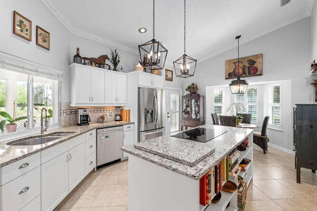 kitchen featuring open shelves, a sink, stainless steel appliances, light tile patterned floors, and ornamental molding