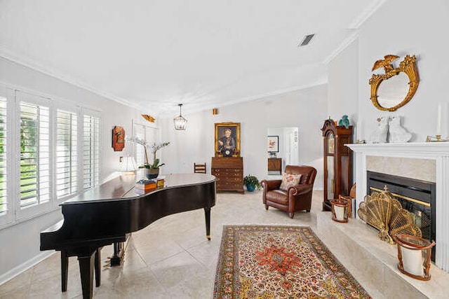 living area with crown molding, plenty of natural light, and a fireplace