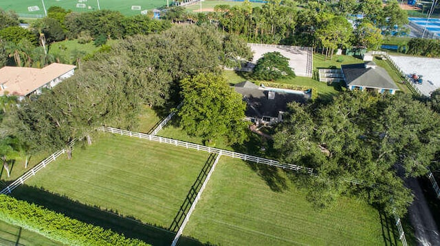 view of yard featuring fence and a rural view