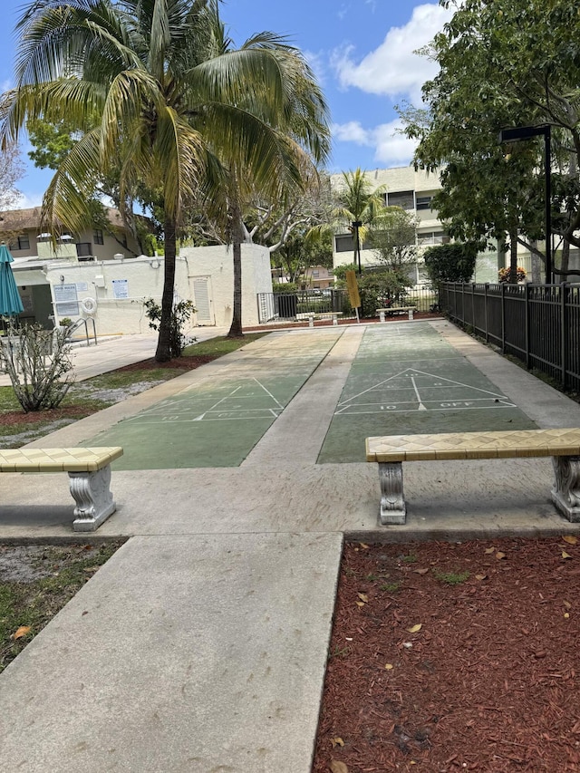 5155 E Sabal Palm Blvd Unit 101, Tamarac, FL 33319 - view of property's community with fence and shuffleboard