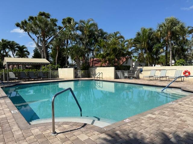 5674 Ainsley Ct, Boynton Beach, FL 33437 - community pool featuring a patio area