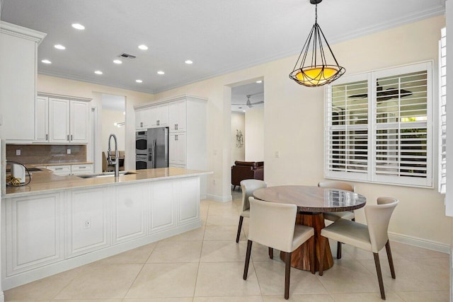 11952 Fox Hill Cir, Boynton Beach, FL 33473 - dining area featuring ornamental molding, baseboards, light tile patterned floors, and recessed lighting