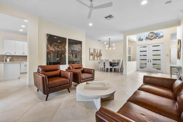 11952 Fox Hill Cir, Boynton Beach, FL 33473 - living area with ornamental molding, light tile patterned floors, a ceiling fan, recessed lighting, and a chandelier