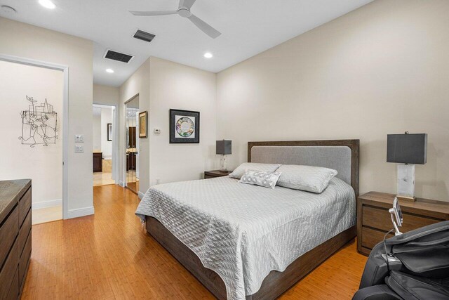 11952 Fox Hill Cir, Boynton Beach, FL 33473 - bedroom with light wood-style flooring, recessed lighting, connected bathroom, baseboards, and ceiling fan