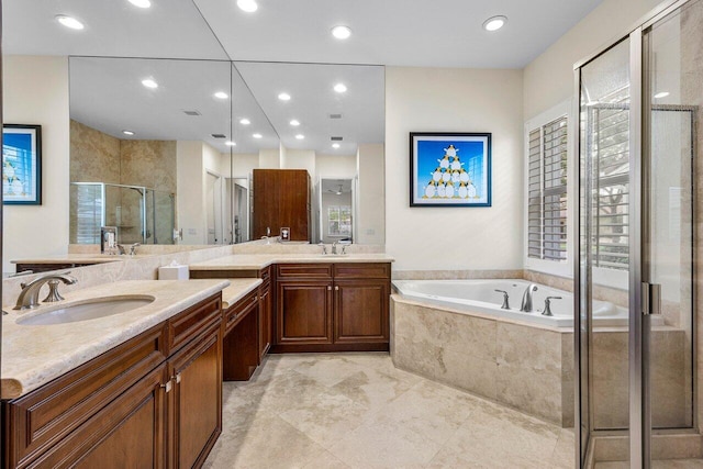 11952 Fox Hill Cir, Boynton Beach, FL 33473 - bathroom featuring a stall shower, a bath, double vanity, and recessed lighting