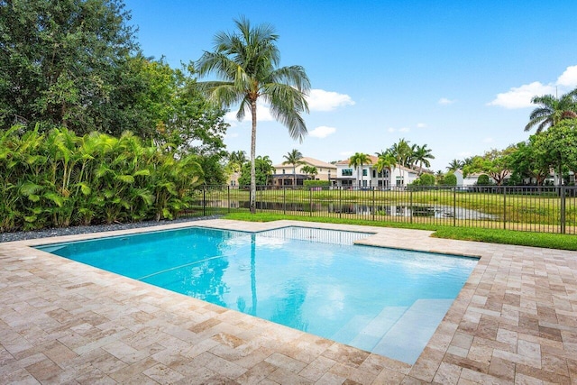 11952 Fox Hill Cir, Boynton Beach, FL 33473 - view of swimming pool with fence, a patio area, and a water view