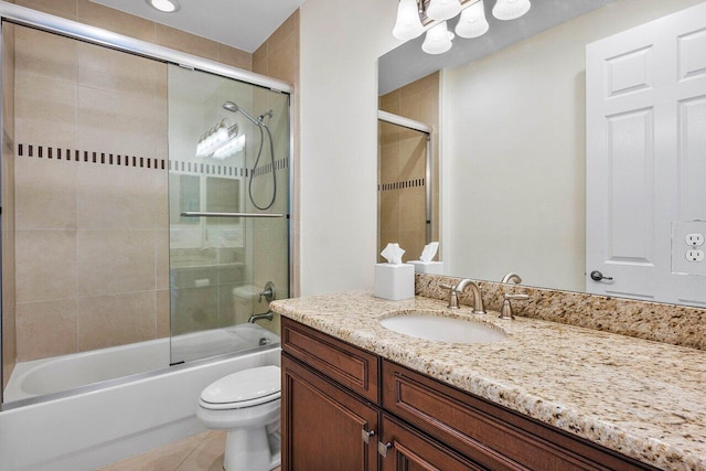 11952 Fox Hill Cir, Boynton Beach, FL 33473 - bathroom featuring toilet, vanity, shower / bath combination with glass door, and tile patterned floors