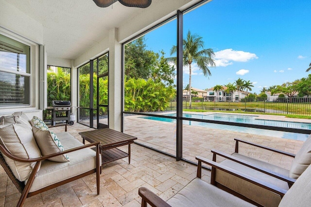 11952 Fox Hill Cir, Boynton Beach, FL 33473 - sunroom / solarium featuring a textured ceiling and stone tile flooring