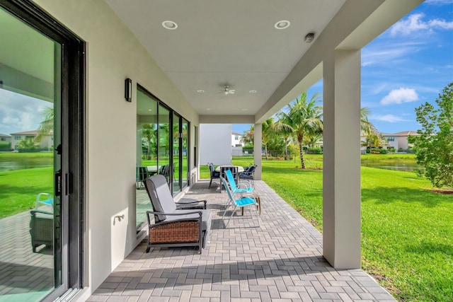 view of patio / terrace featuring a water view