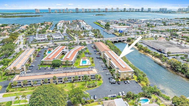 drone / aerial view with a water view and a view of city