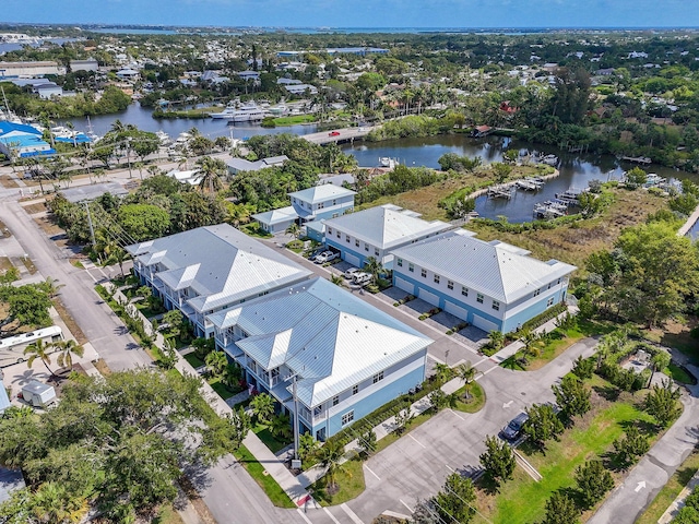 4707 SE Manatee Way, Stuart, FL 34997 - drone / aerial view featuring a water view