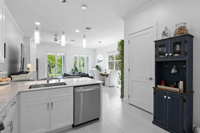 4707 SE Manatee Way, Stuart, FL 34997 - kitchen with crown molding, a healthy amount of sunlight, white cabinets, a sink, and dishwasher