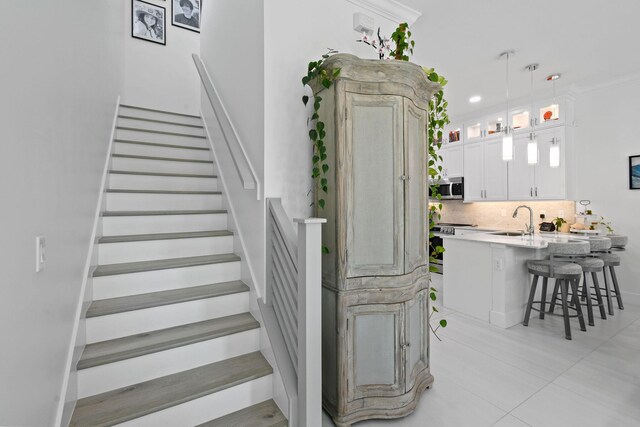 4707 SE Manatee Way, Stuart, FL 34997 - staircase with tile patterned floors
