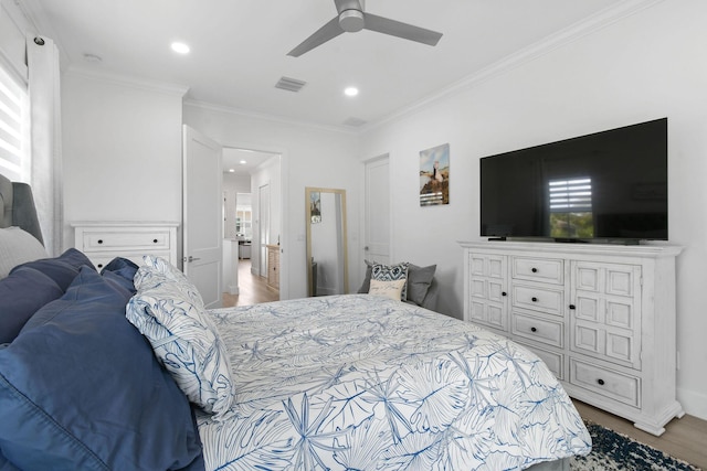 4707 SE Manatee Way, Stuart, FL 34997 - bedroom with recessed lighting, visible vents, ornamental molding, and wood finished floors