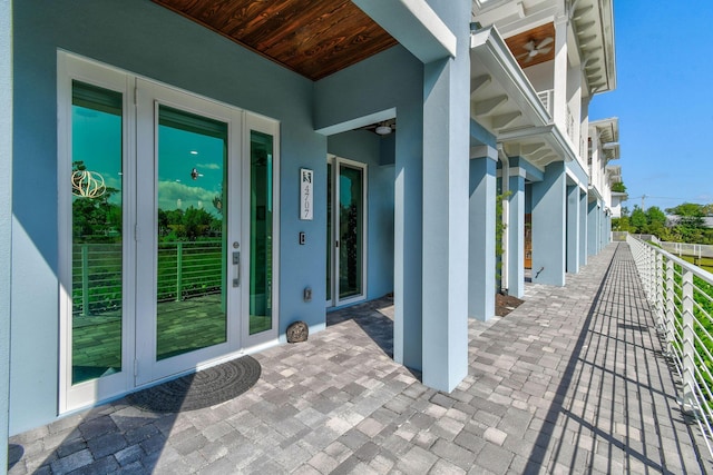 4707 SE Manatee Way, Stuart, FL 34997 - view of patio featuring french doors and ceiling fan
