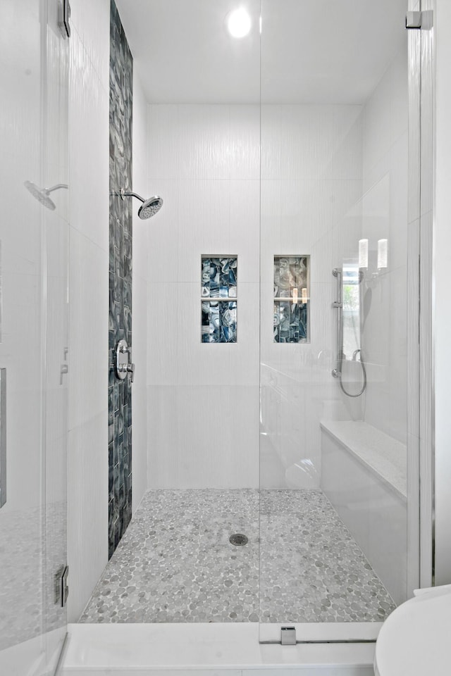 4707 SE Manatee Way, Stuart, FL 34997 - bathroom with a shower stall and toilet