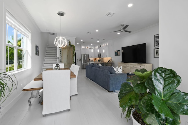 4707 SE Manatee Way, Stuart, FL 34997 - dining space with visible vents, ornamental molding, stairs, ceiling fan, and recessed lighting