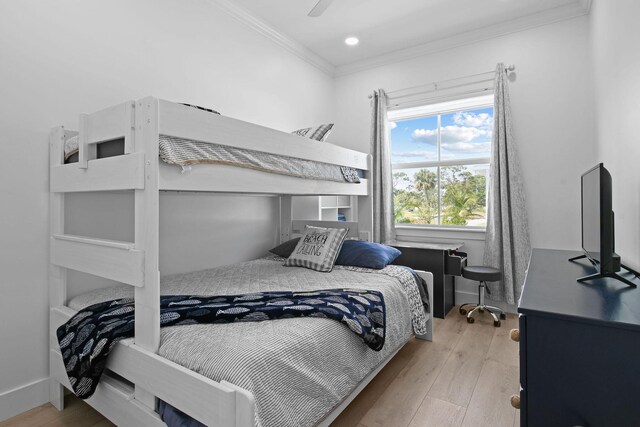 4707 SE Manatee Way, Stuart, FL 34997 - bedroom featuring crown molding, a ceiling fan, recessed lighting, and wood finished floors