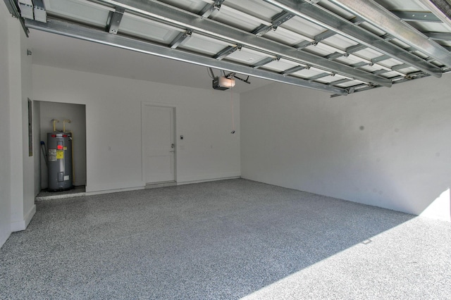 4707 SE Manatee Way, Stuart, FL 34997 - garage featuring a garage door opener and electric water heater