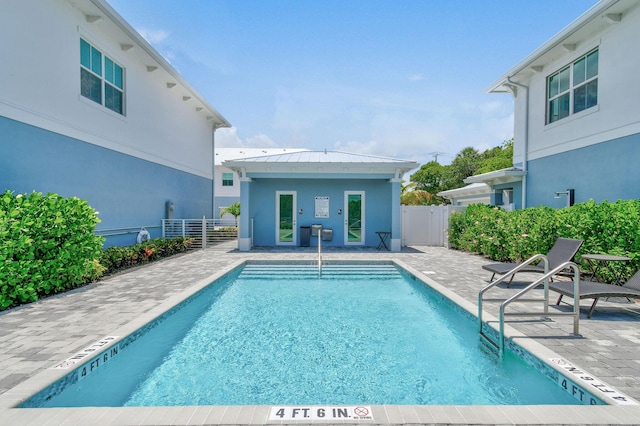 4707 SE Manatee Way, Stuart, FL 34997 - pool with fence and a patio area