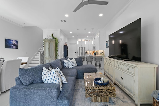4707 SE Manatee Way, Stuart, FL 34997 - living room with crown molding, recessed lighting, and visible vents