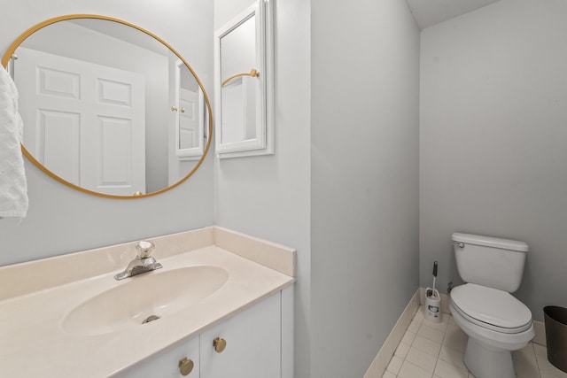 7997 Lakewood Cove Ct, Lake Worth, FL 33467 - half bath featuring tile patterned flooring, baseboards, toilet, and vanity