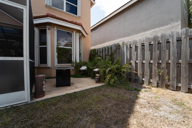 7997 Lakewood Cove Ct, Lake Worth, FL 33467 - view of yard featuring fence and a patio area