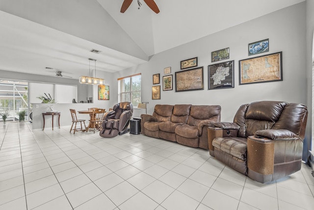 7997 Lakewood Cove Ct, Lake Worth, FL 33467 - living room with visible vents, lofted ceiling, a healthy amount of sunlight, a ceiling fan, and light tile patterned floors