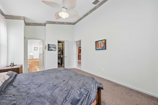 6780 Camille St, Boynton Beach, FL 33437 - bedroom featuring baseboards, carpet flooring, connected bathroom, and visible vents
