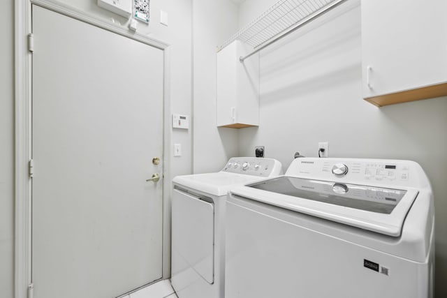 6780 Camille St, Boynton Beach, FL 33437 - washroom with cabinet space and independent washer and dryer